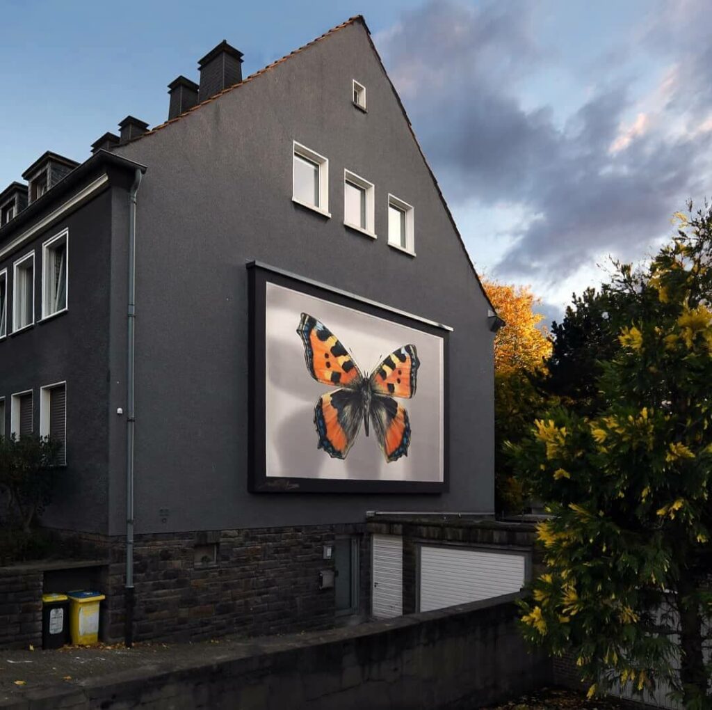 Der Algaispilot Dortmund, Germany | Butterfly mural by street artist Mantra