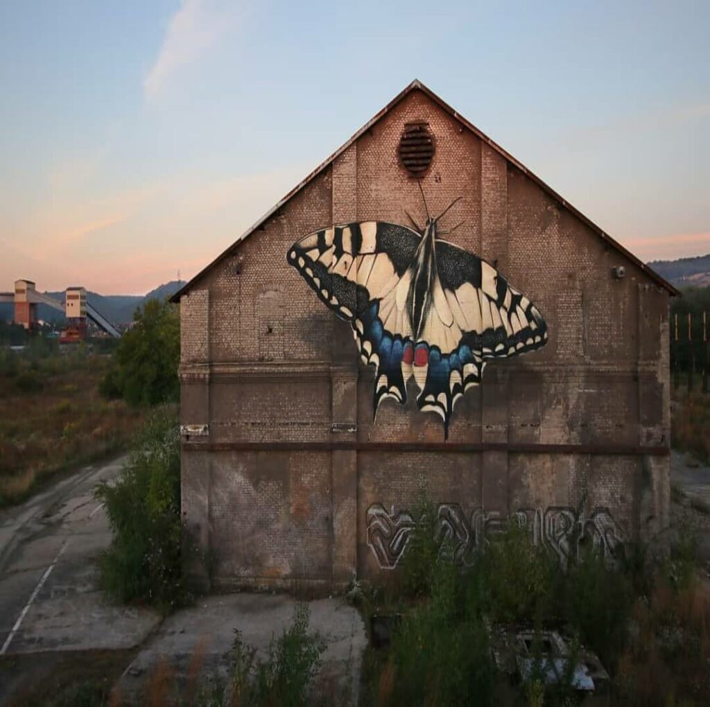 La renaissance du Machaon, Rombas, France | Butterfly mural by street artist Mantra