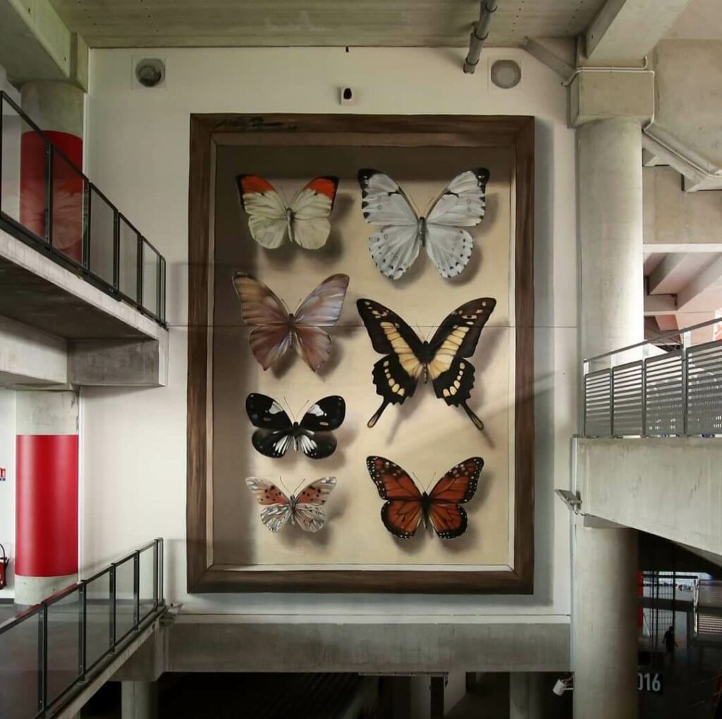 Numero 7, Lyon, France | Butterfly mural by street artist Mantra