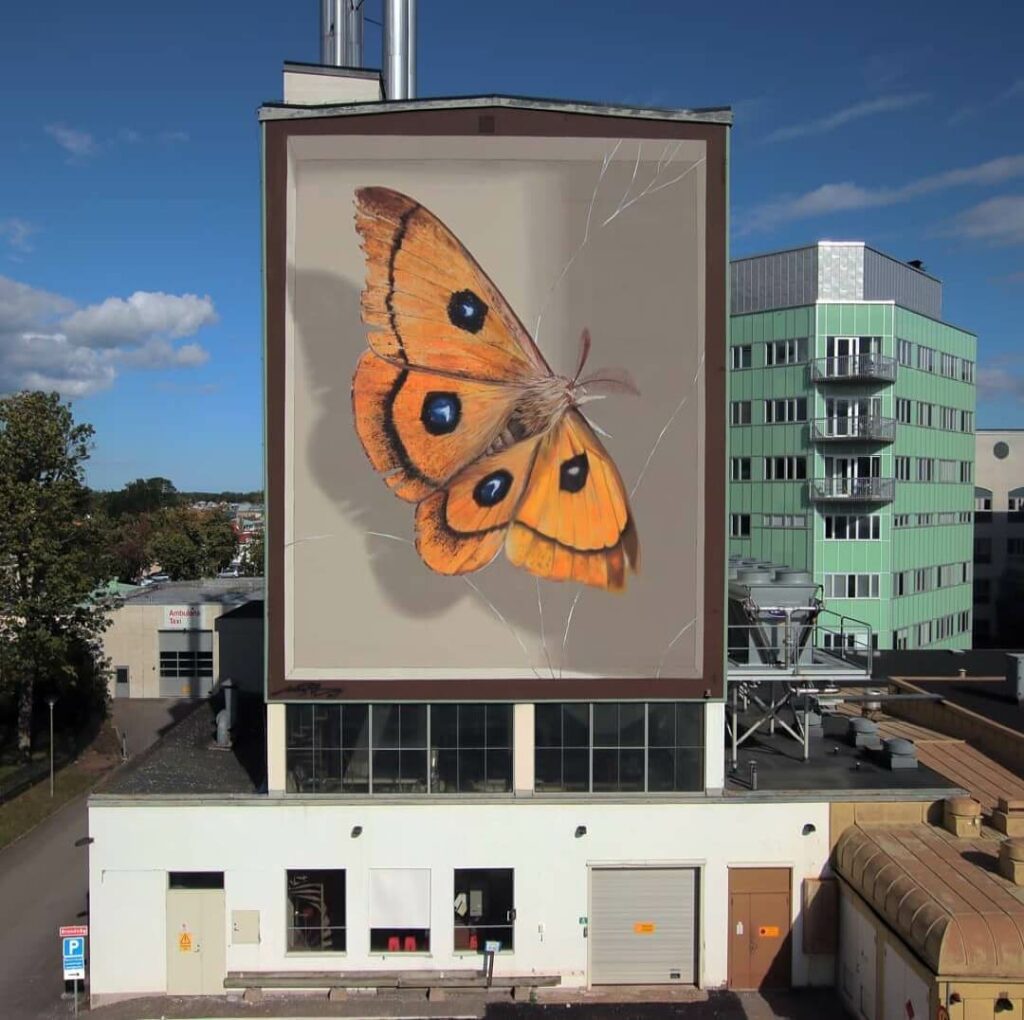 The Emperor Tau, Vastervik, Sweden | Butterfly mural by street artist Mantra